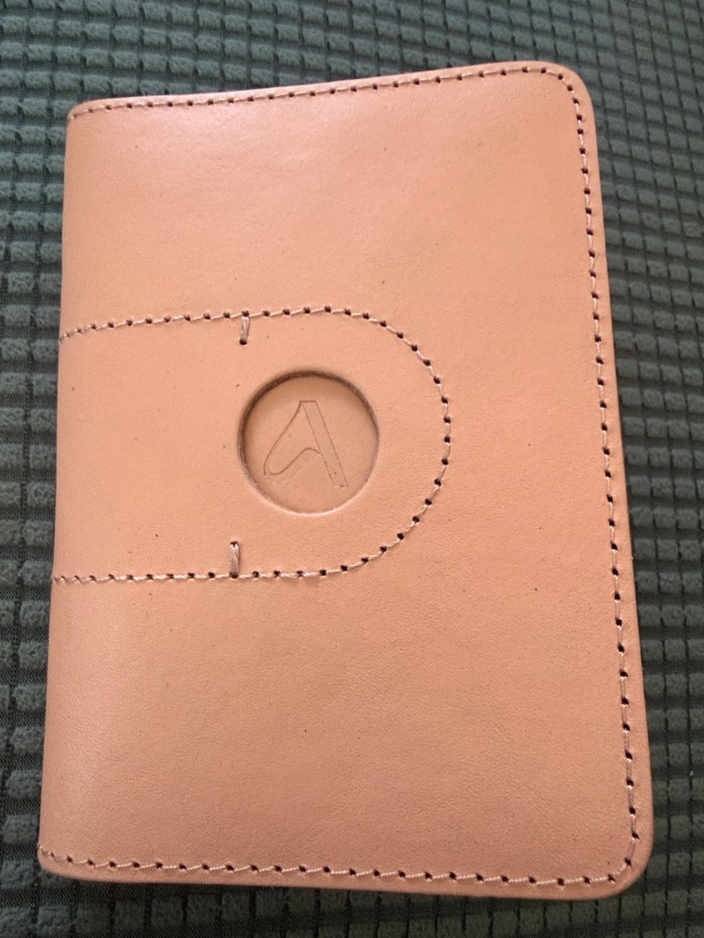 Blush Leather Passport Holder with AirTag Slot w/Embossed Logo